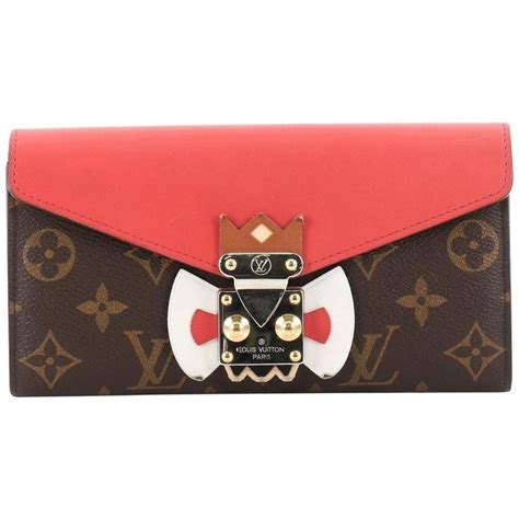 louis vuitton tribal mask sarah wallet|louis vuitton wallet snap.